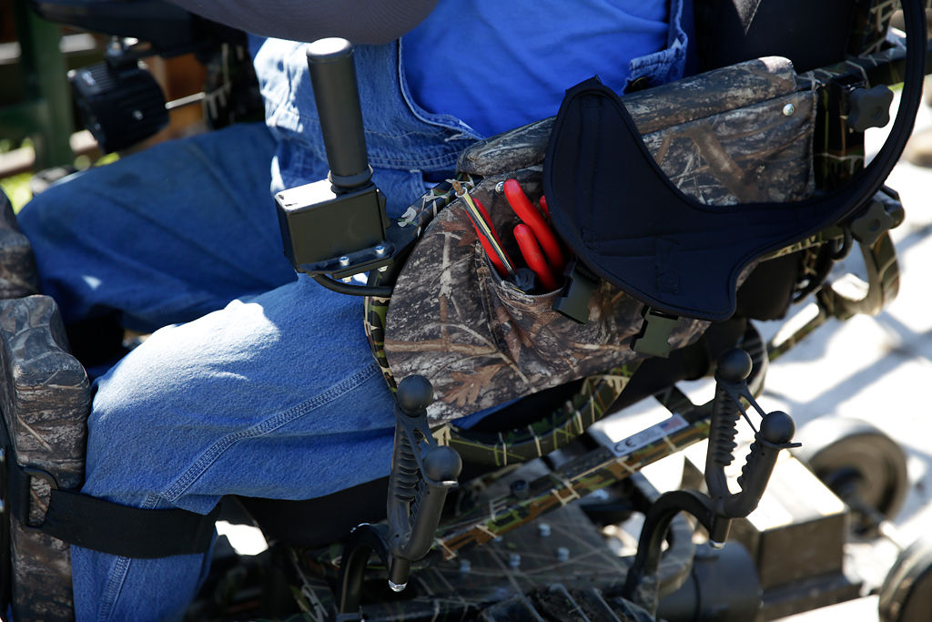 Tools sit in a pouch on Doug Boswell's all-terrain wheelchair